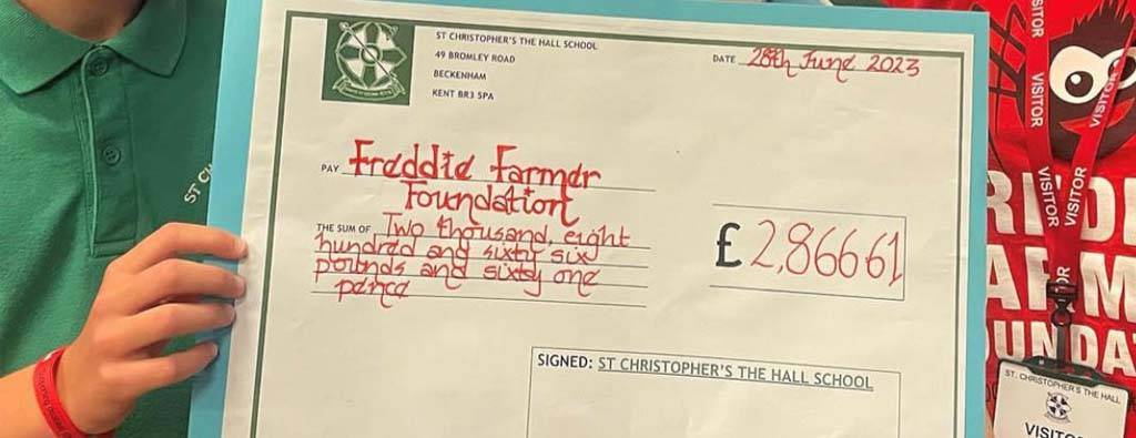 Cheque from Beckenham School Bromley for charity